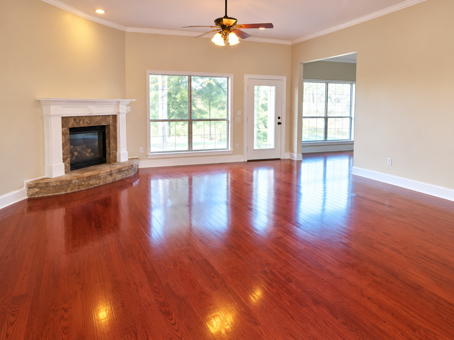 Finished hardwood flooring in an open living room